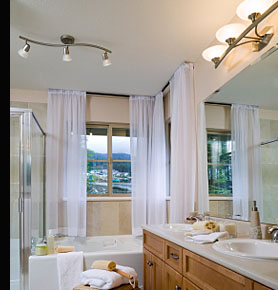 Bathroom Lighting with surface mounted spot bar and feature wall light above the mirror